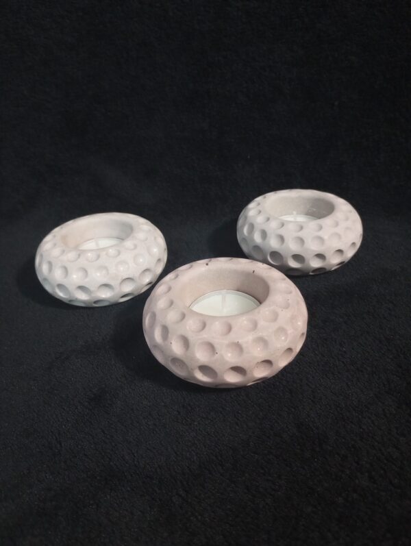 These single Tea Light Candle Holders are made of Ionized concrete with our custom mix of durable material to last a long time.